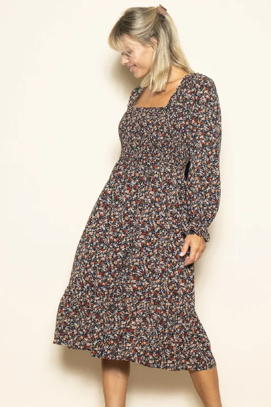 Bold fashion choices for the confident woman   Black Floral Smocked Velvet Back Tie Midi Dress